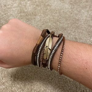 Brown and gold wrap bracelet with feather
